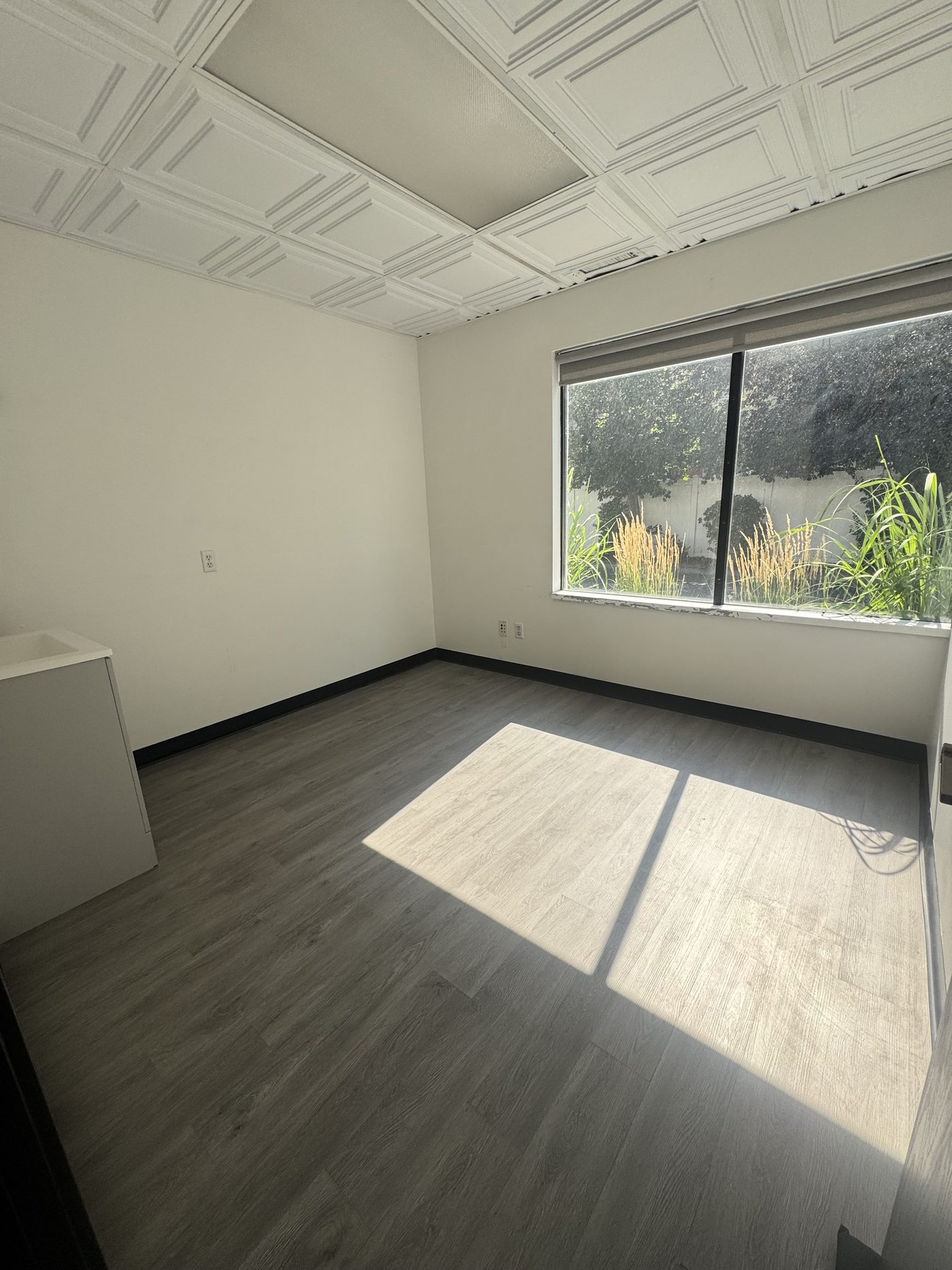 Sunlit private salon suite at Elevae Suites